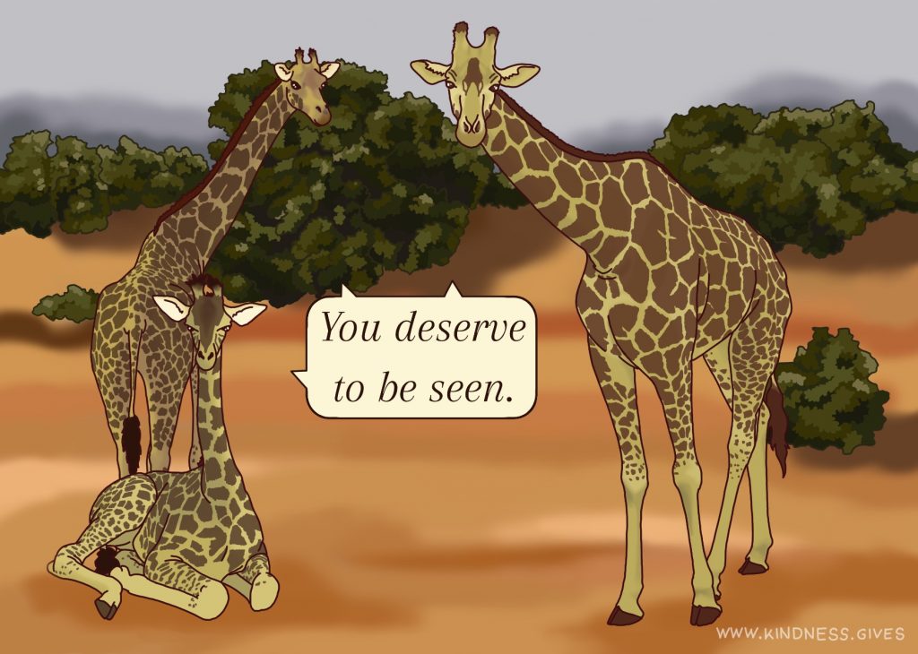 Three giraffes, one on the ground, two standing, saying "You deserve to be seen."
