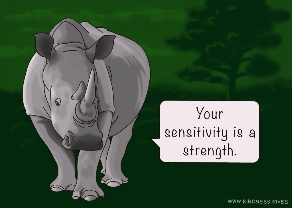 A rhinozeros before a deep green background saying "Your sensitivity is a strength."